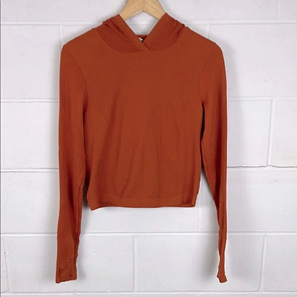 Athleta women’s flurry seamless cropped burnt orange hoodie